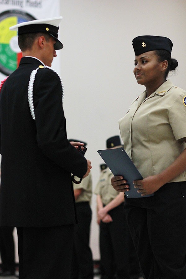 Henderson Rhakiah receives Cadet of the Month award.