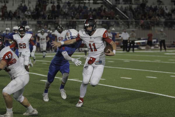 Varsity football has heart breaking defeat to district rivals