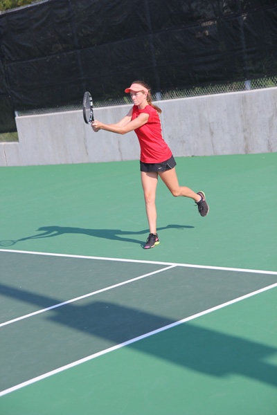 Senior varsity player Kristin Janak practices after school. Both JV and varsity teams practice daily.