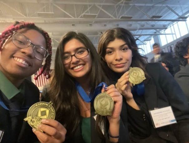   –Saniya Oak, Madison Fuentes, & Sydney Ross celebrated their victory at DECA state.
