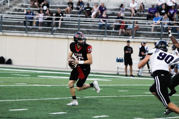 Senior, Jackson Arnot prepares to throw against Cedar Ridge on September 15th during the Homecoming Game. Vista Ridge ended the game with a win, 28-7.