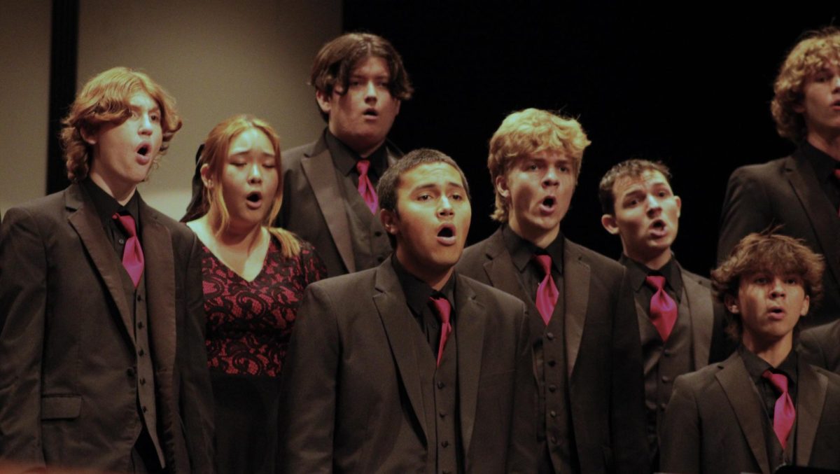 VRHS Chorale students: Caleb Toowey, Lianah Kim, Oscar Norton, Sione Hansen, Jason Hatheway, Mark Caltagirone, Trenton Gardiol and Padraig Partin sing "Lacrimosa" and "Tshotsholoza" at the choir fall concert. 