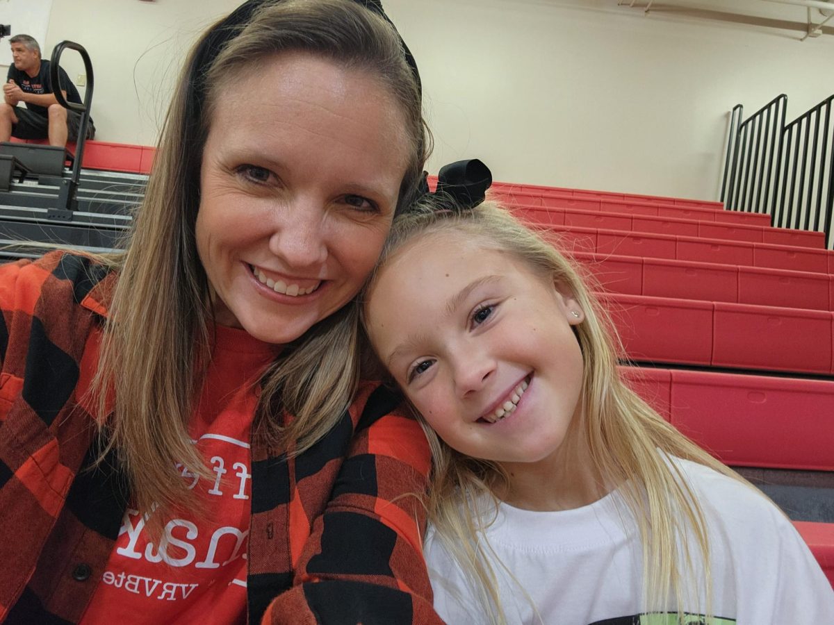 Mrs. Stremple smiles with her daughter as they spend quality time together. 