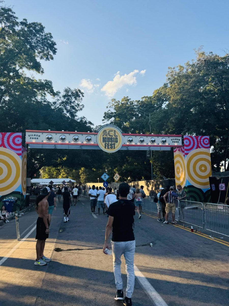 Senior Trey Muniz walks through the main gate at ACL