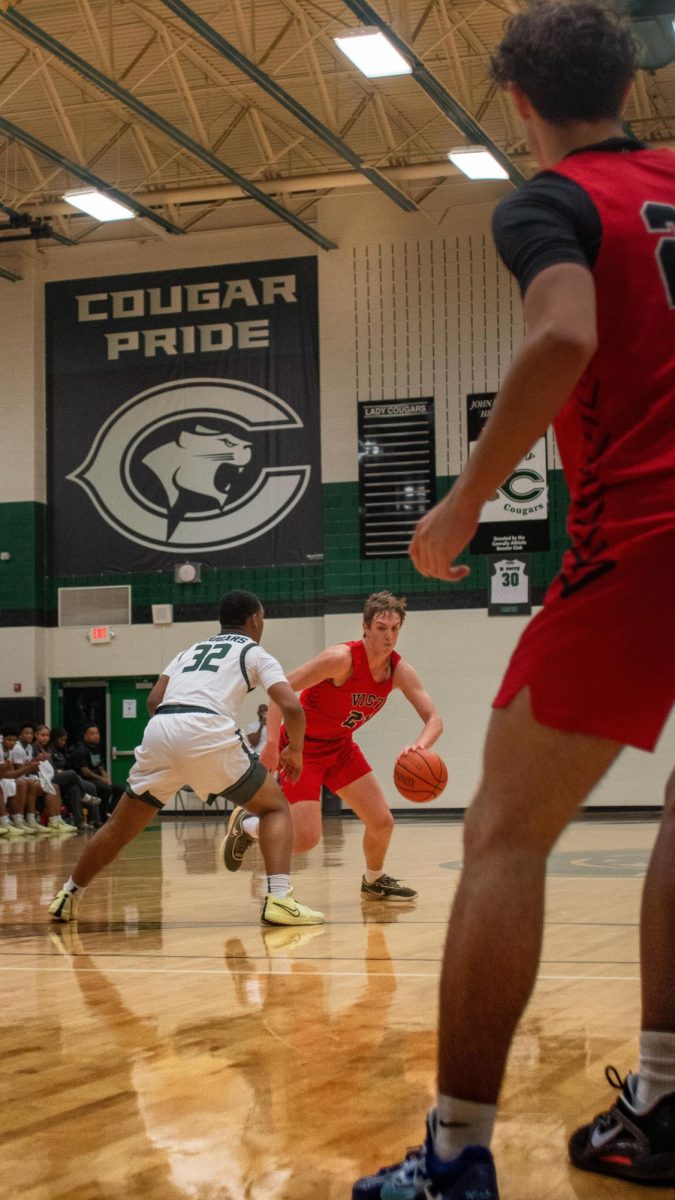 Junior Power Forward Gavin Howard bolt through the players to dominate against Connally.