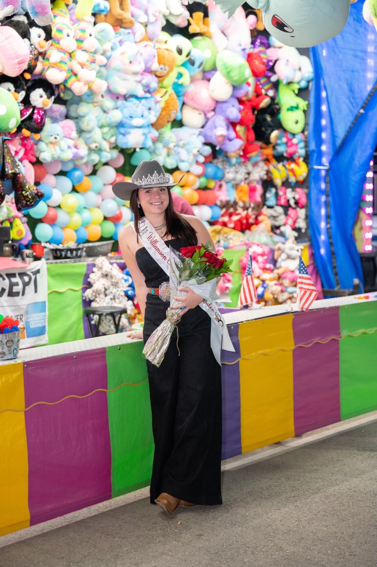 The rodeo queen looking over her fair!